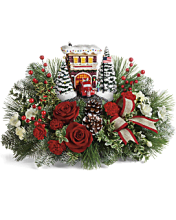 A Thomas Kinkade\'s Festive Fire Station Bouquet